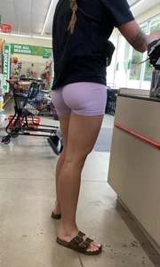 in purple Lycra shorts…