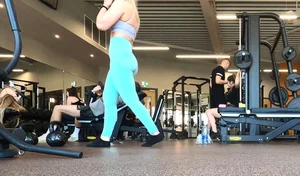 Gym blonde in turquoise leggings notices me and doesn’t mind, even moves in front of me later for some close-ups