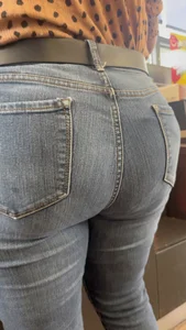 Pawg blonde filling out jeans. Slight VPL
