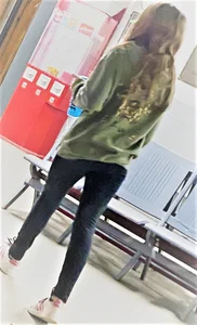 Skinny hottie wearing tight jeans street sneaky photo