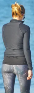 Beach redhead milf in patterened leggings at the beach