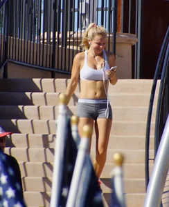 Sexy hot blonde in tight grey spandex shorts with amazing body