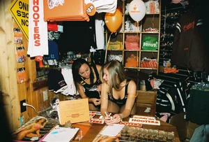 Candid sexy Hooters girls in their uniforms
