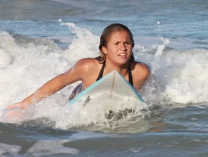 Hot surfer chicks out in the water