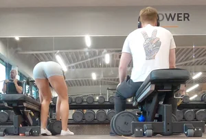 Gym brunette in tight grey shorts bending over, part 3