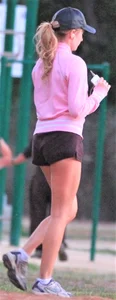 Beautiful skinny girl out for a walk in little shorts