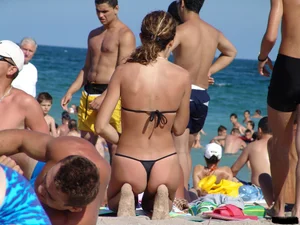 Beach voyeur babes in bikinis, thongs and topless