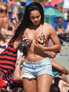 Pretty brunette in a bikini at the beach