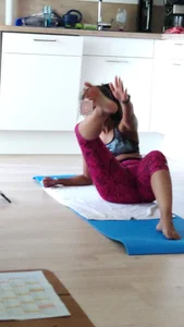 Sexy girlfriend doing yoga at home in leggings