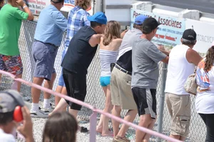 Skinny babe with a cute little ass in tiny blue shorts