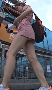 Sexy candid nerdy chick showing her ass cheeks in pink shorts