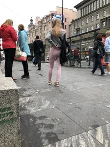 Cute skinny blonde candid teen wearing tight pink jeans