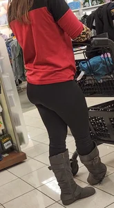 Brunette with a tight butt, boots, and a VPL