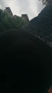 Girl with a nice ass in leggings walking down the street