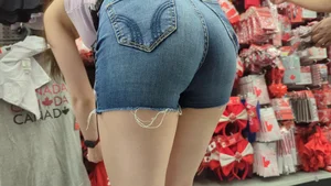 Awesome candid bubble booty in denim shorts, closeup creepshot at the store