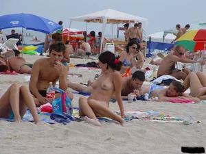 Beach voyeur girls in bikinis, thongs and topless