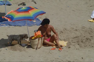 Girls on a nude beach in Sitges, Spain