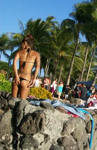 Beach shower girl with cute little ass in tiny black bikini