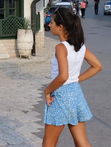 Skinny girl wearing shorts on the street