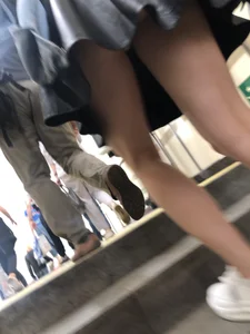 Awesome Candid Girl in a Leather Skirt And Sneakers Walking Down a Street, Then Flashing Her White Panties on the Stairs Creepshots Gallery