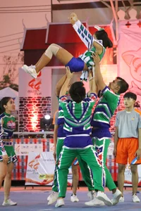 Bunch of athletic Thai cheerleaders at a competition