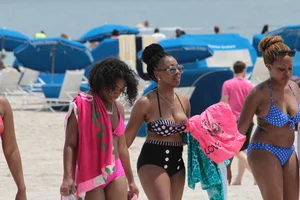 Ebony beach and bikini girls