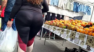 Milf with a tremendous hot ass in the market