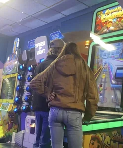 Skinny teens in the arcade