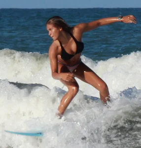Hot surfer chicks out in the water