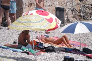 Nude girls on a beach in Hvar, Croatia
