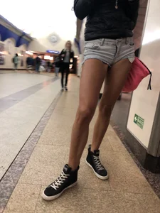 Hot Milf in Mini Shorts on the Subway Escalator and in the Train Candid Gallery