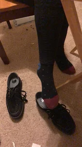 Feet in Socks With Shoes Taken Off Under Desk Closeup Creepshot