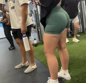 Green shorts bent over