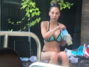Hot girl at the pool in her bikini with big tits