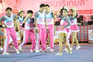 Bunch of athletic Thai cheerleaders at a competition