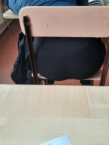 College Teen's Ass in Tight Pants Closeup in Class