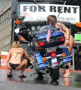 Thick sexy cutie washing motorcycles in sexy thong bikini with big booty
