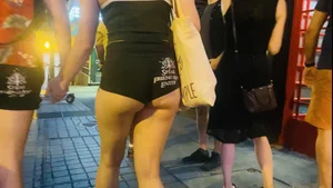 Cheeks hanging out black shorts