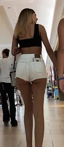 Tan teeen shows off her butt cheeks