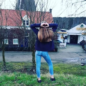 Bunch of teens in shorts and skinny jeans hanging around