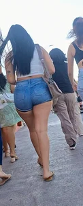 super sexy denim short shorts on this brunette with tremendous legs and big butt