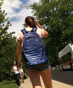 Hot college girl in little jean shorts showing some cheeks and legs