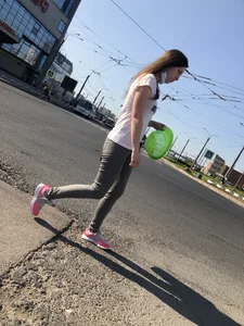Nice candid girl wearing tight grey sweatpants, a mask and a hat