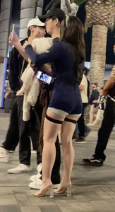 Asian baddie with great legs, heels and Cop costume