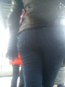 Candid Booty in Blue Jeans Street Closeup Photo