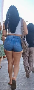 super sexy denim short shorts on this brunette with tremendous legs and big butt