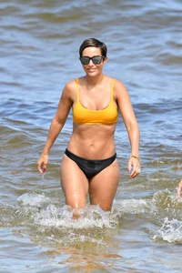 Frankie Bridge nip slips in a bikini on the beach