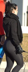 Brunette walking in leggings with a thick booty and showing some camel toe