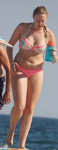 Thick blonde bikini babe on the beach