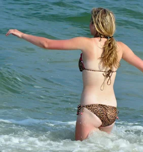 Cheetah print bikini blonde at the beach with nice body